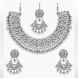 Traditional Indian jewelry with many tikka silver